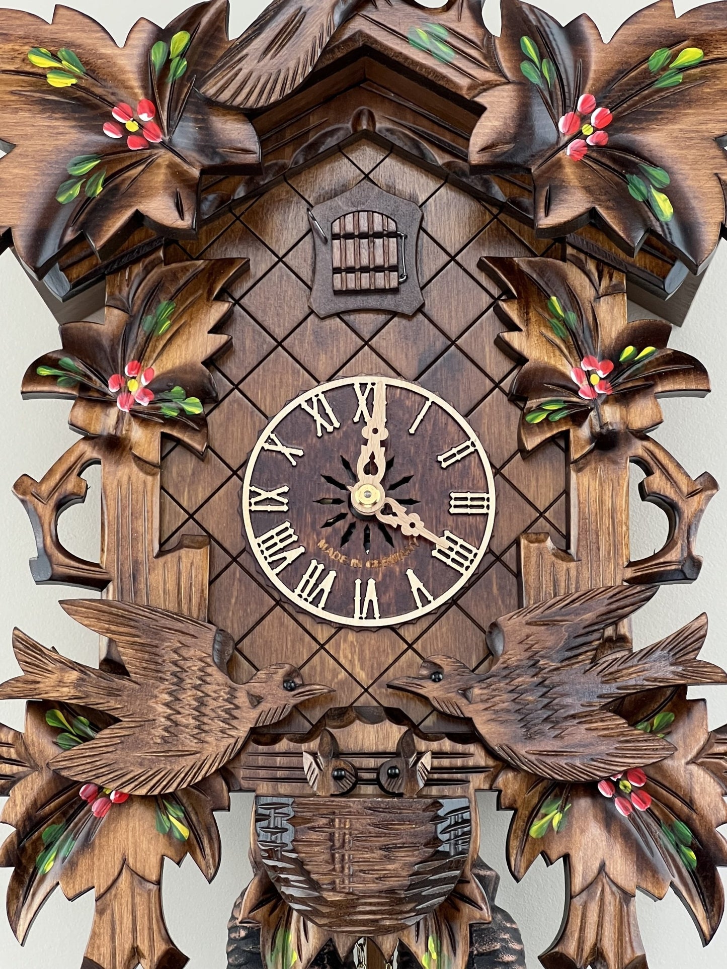 River City Clocks 16" Eight Day Cuckoo Clock with Hand-painted Flowers, Leaves, and Animated Birds Feeding Baby Birds