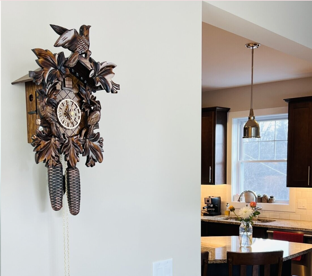 River City Clocks 16" Eight Day Cuckoo Clock with Three Hand-carved Birds and Seven Leaves
